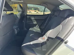 2019 Toyota Camry 2.0G Luxury, белый — фото 15