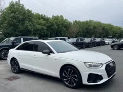 2023 Audi A4L 40 TFSI Luxury Dynamic, белый — фото 3