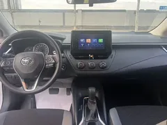 2023 Toyota Corolla 1.2T Pioneer, белый — фото 4
