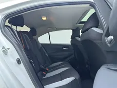 2021 Toyota Corolla 1.2T S-CVT Elite Plus, белый — фото 2