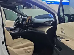 2023 Toyota Sienna 2.5L Hybrid Premium, белый — фото 9