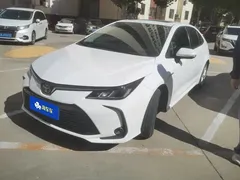 2021 Toyota Corolla Hybrid 1.8L E-CVT Elite, белый — фото 1