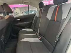 2021 Toyota Corolla 1.2T S-CVT Pioneer Plus, белый — фото 14