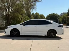 2021 Toyota Corolla TNGA 1.5L CVT GR Sport, белый — фото 8