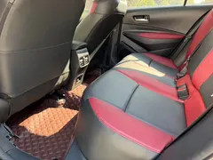 2021 Toyota Corolla TNGA 1.5L CVT GR Sport, белый — фото 12