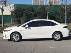 2023 Toyota Corolla 1.8L Hybrid Elite, белый — фото 3