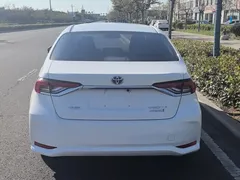 2023 Toyota Corolla 1.8L Hybrid Elite, белый — фото 4