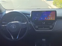2023 Toyota Corolla 1.8L Hybrid Elite, белый — фото 9