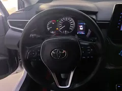 2022 Toyota Corolla 1.2T S-CVT Pioneer Plus, белый — фото 15
