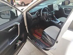 2021 Toyota Wildlander Hybrid 2.5L E-CVT 2WD Luxury, белый — фото 12
