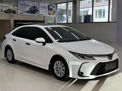 2021 Toyota Corolla TNGA 1.5L CVT Elite, белый — фото 3