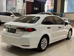 2021 Toyota Corolla TNGA 1.5L CVT Elite, белый — фото 4