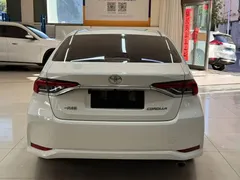 2021 Toyota Corolla TNGA 1.5L CVT Elite, белый — фото 5