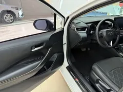 2021 Toyota Corolla TNGA 1.5L CVT Elite, белый — фото 8