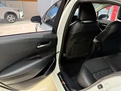 2021 Toyota Corolla TNGA 1.5L CVT Elite, белый — фото 17