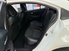 2021 Toyota Corolla TNGA 1.5L CVT Elite, белый — фото 18