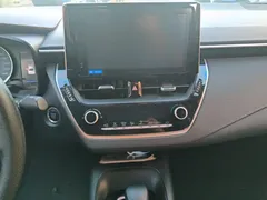 2021 Toyota Corolla 1.2T S-CVT Elite Plus, белый — фото 13