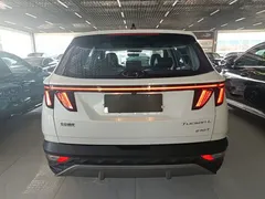2023 Hyundai Tucson L 1.5T AT 2WD DLX Luxury, белый — фото 6