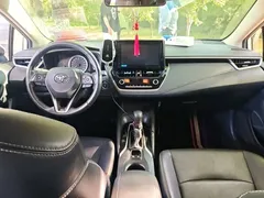 2021 Toyota Corolla 1.2T S-CVT Luxury, белый — фото 5