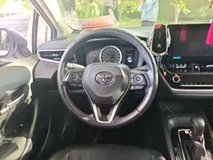 2021 Toyota Corolla 1.2T S-CVT Luxury, белый — фото 6