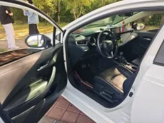 2021 Toyota Corolla 1.2T S-CVT Luxury, белый — фото 12