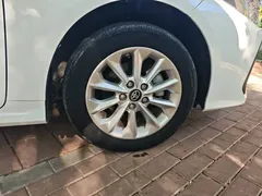2021 Toyota Corolla 1.2T S-CVT Luxury, белый — фото 24
