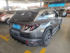 2021 Hyundai Tucson L 1.5T DCT LUX Premium — фото 7