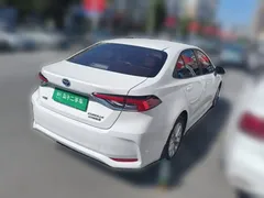 2021 Toyota Corolla Hybrid 1.8L E-CVT Elite, белый — фото 4