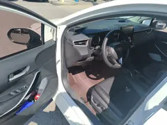 2021 Toyota Corolla Hybrid 1.8L E-CVT Elite, белый — фото 12