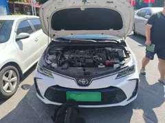 2021 Toyota Corolla Hybrid 1.8L E-CVT Elite, белый — фото 16