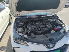 2021 Toyota Corolla Hybrid 1.8L E-CVT Elite, белый — фото 20