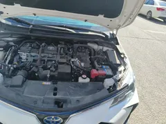 2021 Toyota Corolla Hybrid 1.8L E-CVT Elite, белый — фото 21