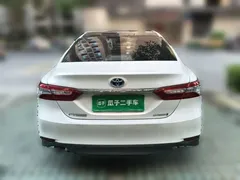 2019 Toyota Camry Hybrid 2.5HG Luxury, белый — фото 3