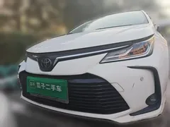2021 Toyota Corolla TNGA 1.5L CVT Elite, белый — фото 2