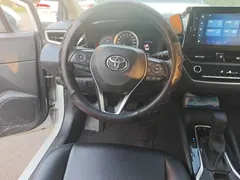 2021 Toyota Corolla TNGA 1.5L CVT Elite, белый — фото 6