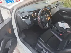 2021 Toyota Corolla TNGA 1.5L CVT Elite, белый — фото 12