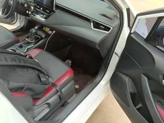 2021 Toyota Corolla TNGA 1.5L CVT GR Sport, белый — фото 8