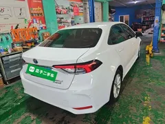 2021 Toyota Corolla Hybrid 1.8L E-CVT Elite, белый — фото 1