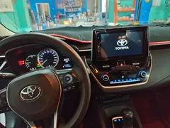 2021 Toyota Corolla Hybrid 1.8L E-CVT Elite, белый — фото 5