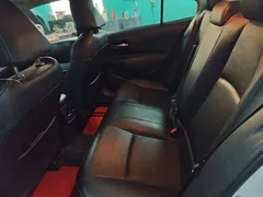2021 Toyota Corolla Hybrid 1.8L E-CVT Elite, белый — фото 13