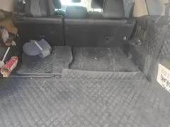2022 Toyota Highlander Hybrid 2.5L 4WD Premium 7-seat, белый — фото 4