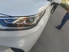 2022 Toyota Highlander Hybrid 2.5L 4WD Premium 7-seat, белый — фото 5