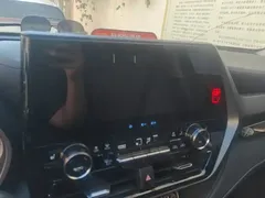 2022 Toyota Highlander Hybrid 2.5L 4WD Premium 7-seat, белый — фото 13