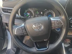 2022 Toyota Highlander Hybrid 2.5L 4WD Premium 7-seat, белый — фото 15