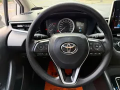 2023 Toyota Corolla 1.2T Elite, белый — фото 13