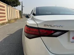 2021 Nissan Sylphy 1.6L TOP CVT Luxury, белый — фото 27