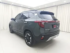 2023 Kia Seltos 1.5L CVT Premium, зелёный — фото 4
