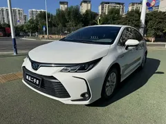 2021 Toyota Corolla Hybrid 1.8L E-CVT Elite, белый — фото 1