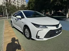 2021 Toyota Corolla Hybrid 1.8L E-CVT Elite, белый — фото 3