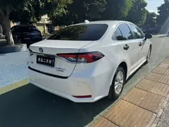 2021 Toyota Corolla Hybrid 1.8L E-CVT Elite, белый — фото 4